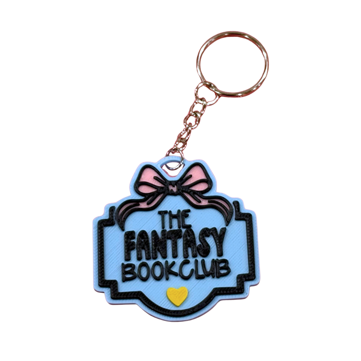Blue Fantasy Book Club 3D printed keyring with layered bow and yellow heart.