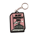 3D printed In My Fantasy Era book keyring in pink with a layered castle design and black border